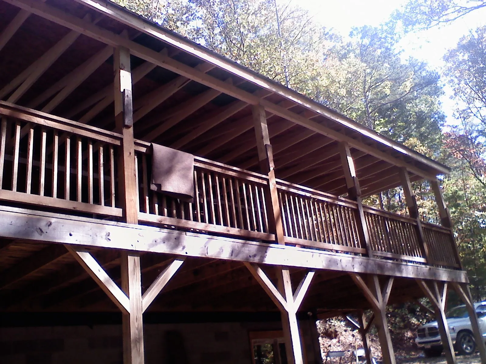 Timber framing under a new elevated porch and deck — Roof Leak Repair in Lakota by Roofing Brothers